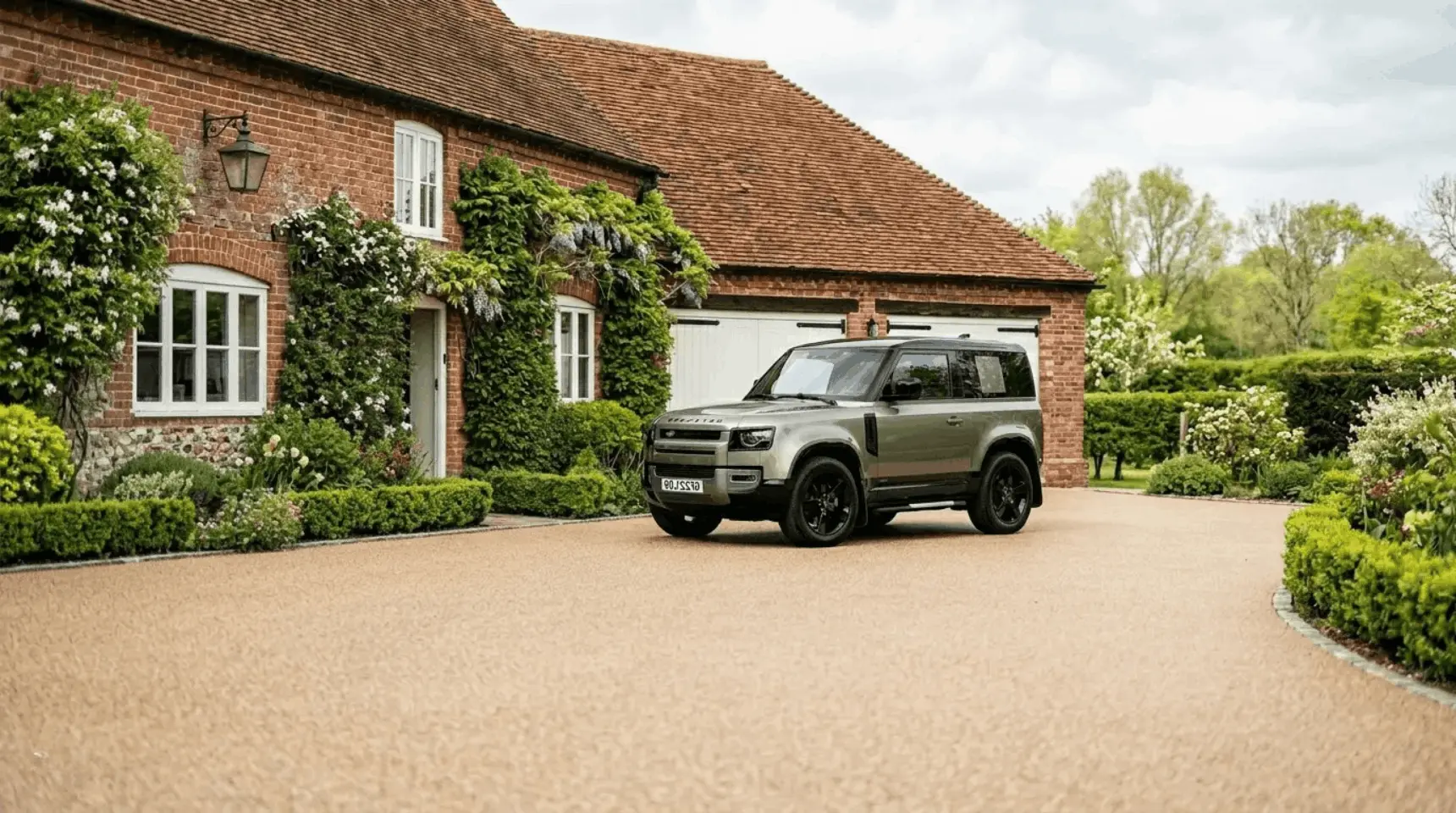 Resin bound driveway with Land Rover parked outside a period property in Berkshire