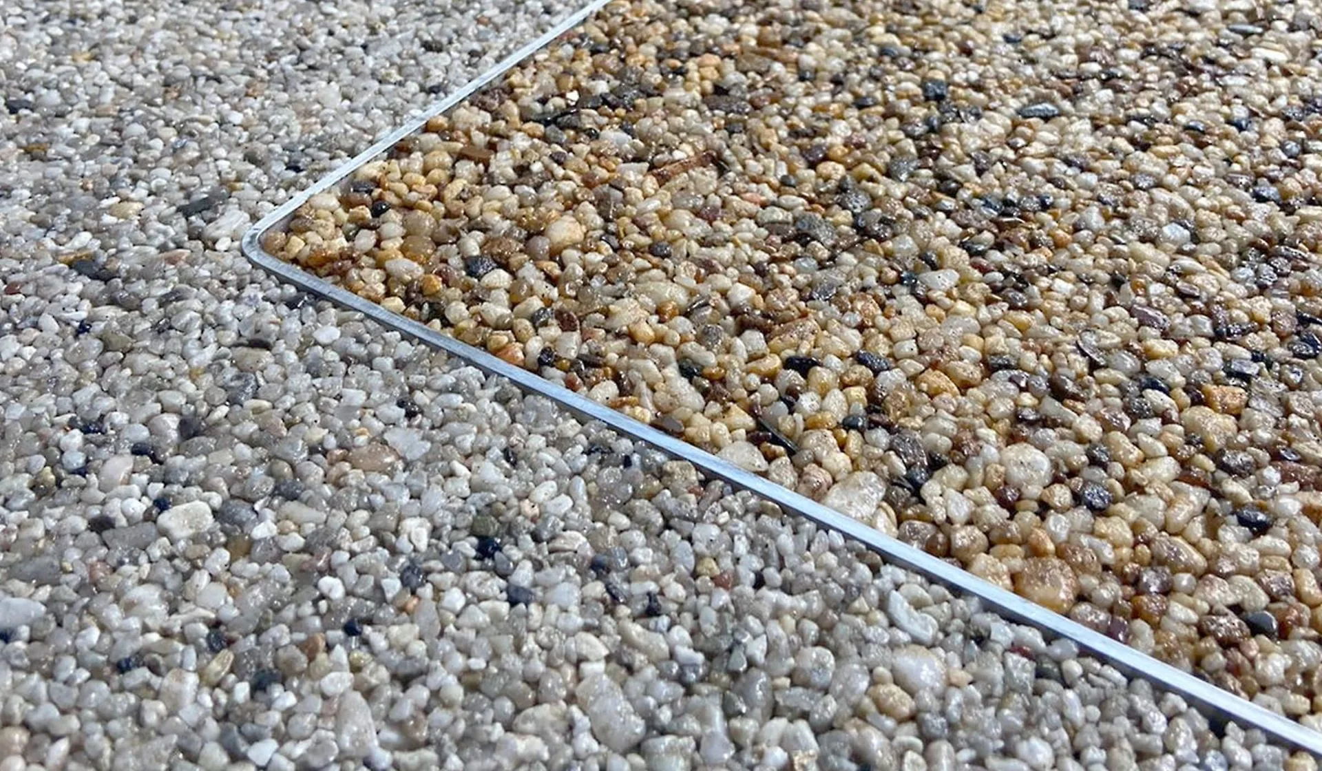 Close-up of resin bound patio surface showing natural aggregate texture